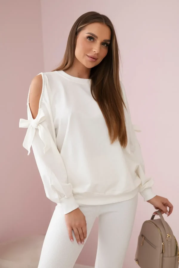 Komplet bluzy z kokardą na rękawach i legginsów